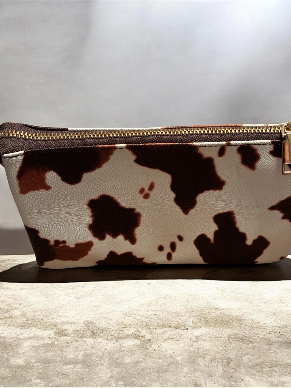 Brown and White Cowhide Print Toiletry Bag